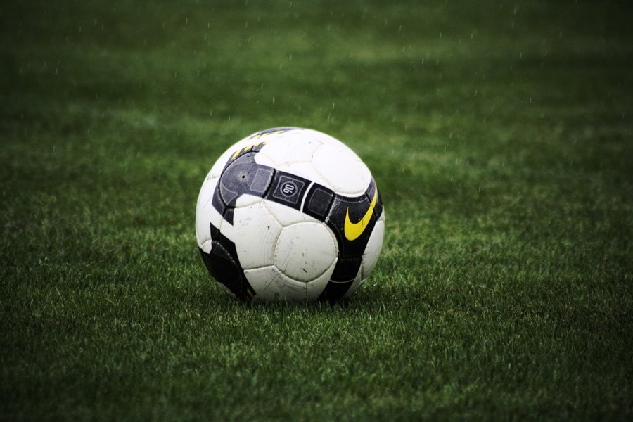 fondo de pantalla de balón de fútbol,balón de fútbol,fútbol americano,fútbol,césped,pallone