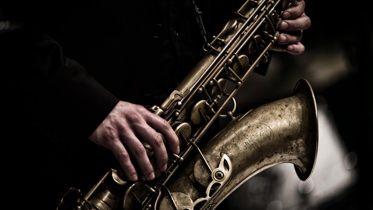 Three Saxophones In Front Of A Blue Powerpoint Background For Free Download  - Slidesdocs